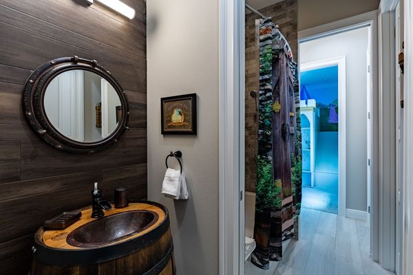 Each bedroom has a separate vanity that fits their theme