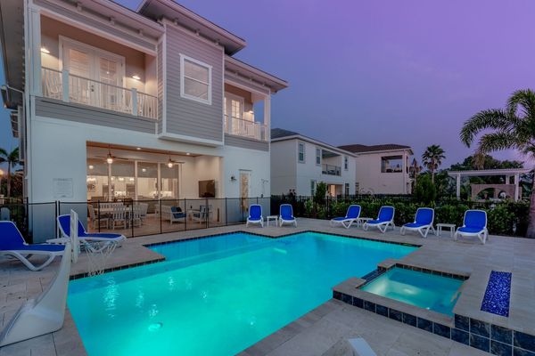 Hangout by the pool day or night and enjoy the sun loungers and spillover spa