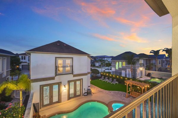 View of the pool area from the second-floor balcony