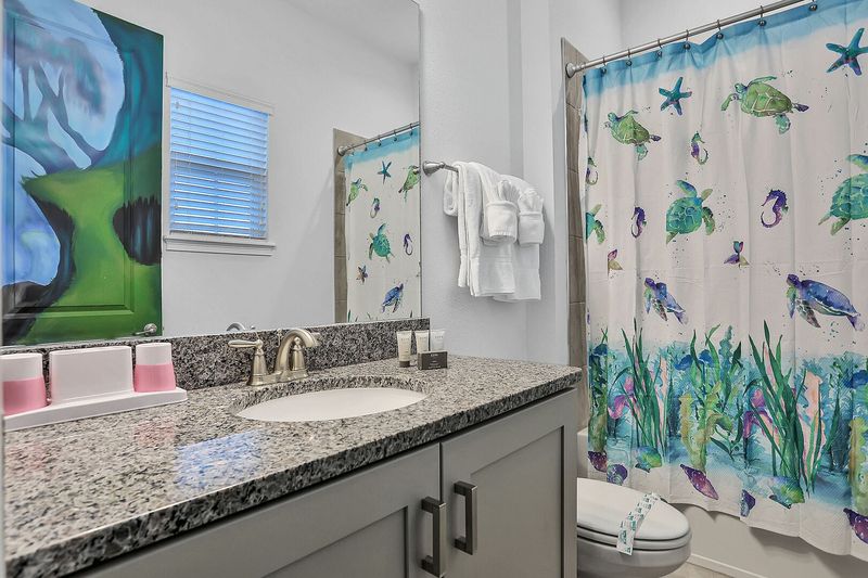 Both feature a shower/tub combination