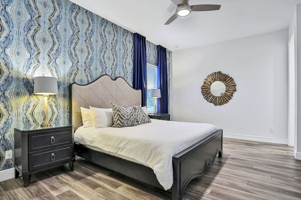 This master suite has a king bed and en suite bathroom