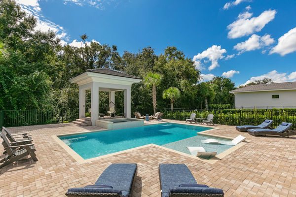 Swim in the pool or relax in the spillover spa