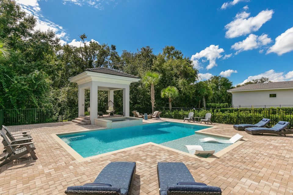 Swim in the pool or relax in the spillover spa