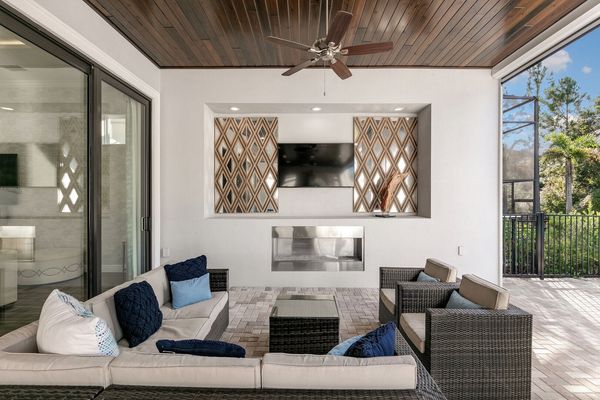 The pool patio has everything you could think of (Disclaimer: Fireplace(s) not allowed for guest use, homeowner use only.)