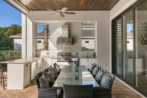 The outdoor dining table seats 10 guests