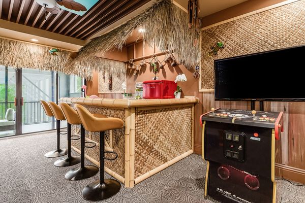 Grab a drink at the custom tiki bar