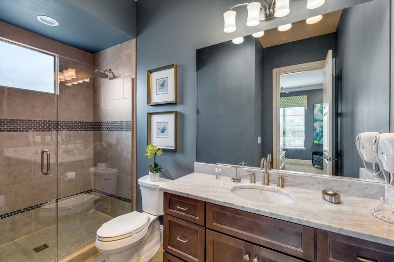 The ensuite bathroom with a large walk-in shower