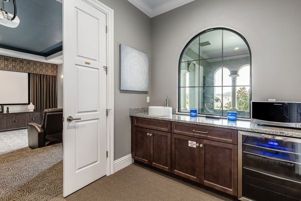 Upstairs wet bar so preparing movie snacks is a breeze