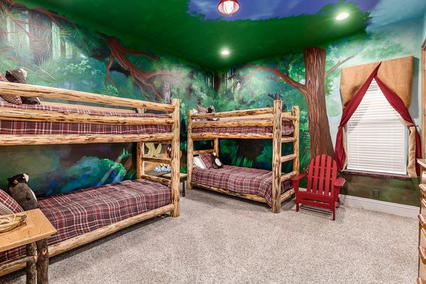 This fun kids bedroom will give kids the feel of the outdoors