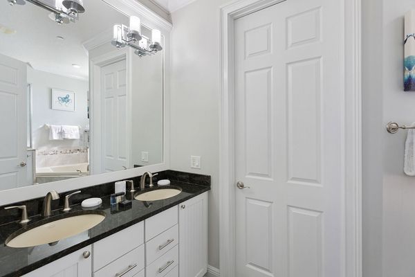 A dual vanity provides plenty of space for getting ready