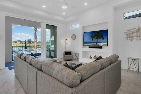 Watch TV on the 75-inch Smart TV