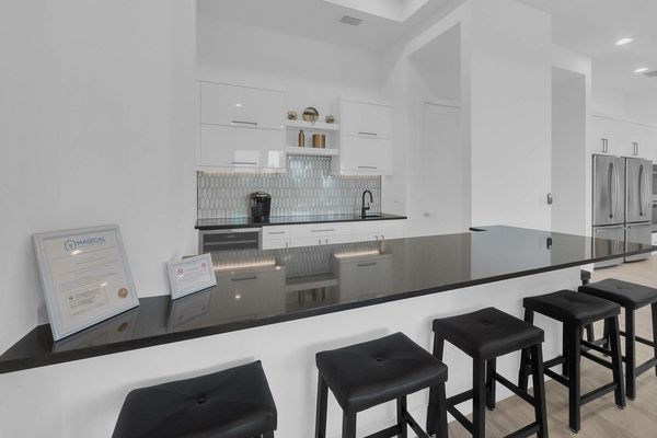 Show off your bartending skills to family and friends at the custom built bar