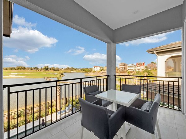 Master bedroom with private balcony access