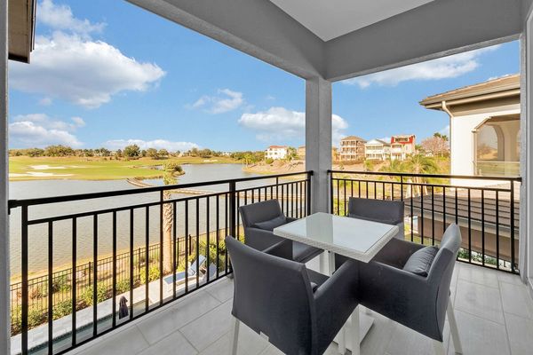 Master bedroom with private balcony access