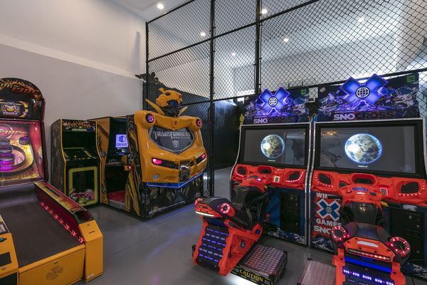 The games room is filled with different arcade games, fun for all ages!