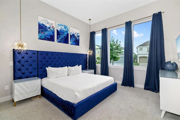 After a day of fun, retreat to this bedroom with a king size bed
