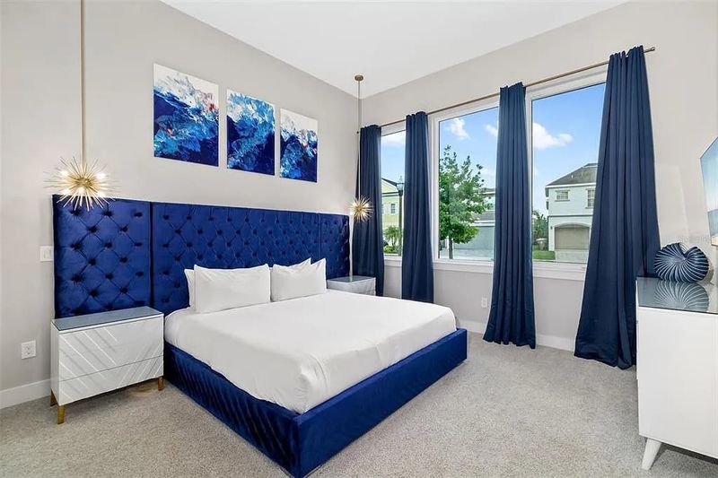 After a day of fun, retreat to this bedroom with a king size bed