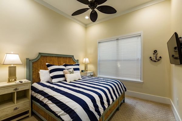 Downstairs nautical bedroom with a King bed