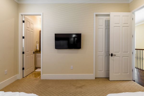 The room has a large closet and ensuite bathroom