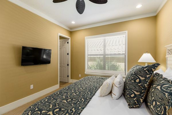 Featuring a TV and ensuite bathroom