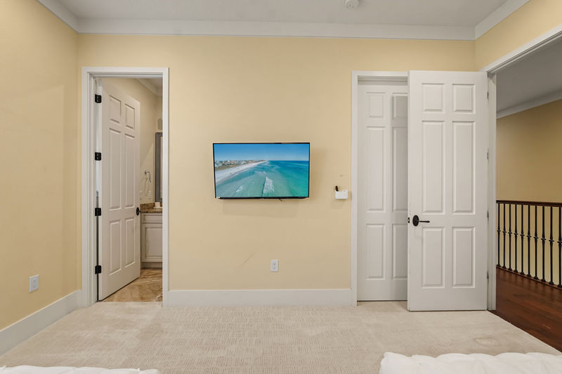 The room has a large closet and ensuite bathroom