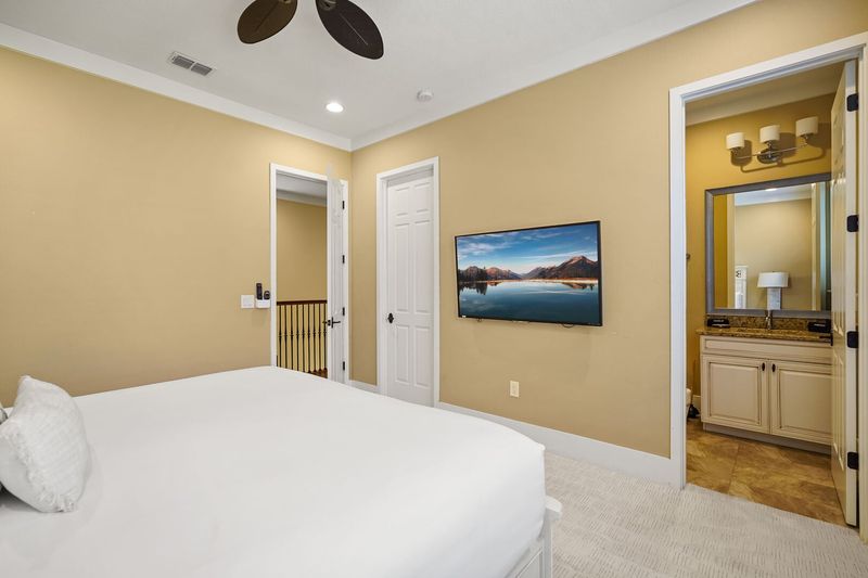 Featuring a TV and ensuite bathroom