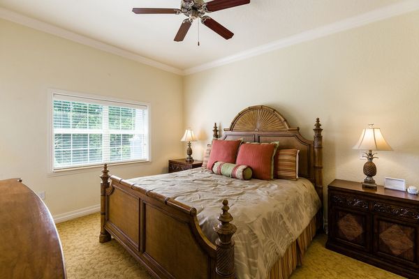 Master suite has a luxurious king size bed