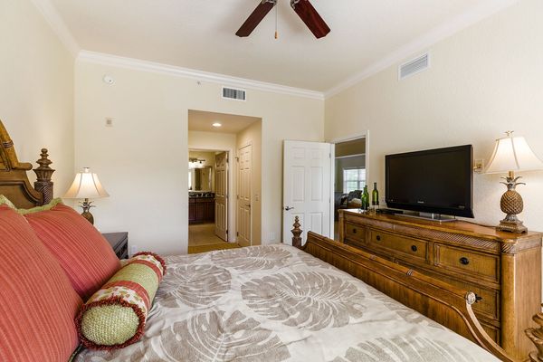 Lounge in bed watching  a tv show