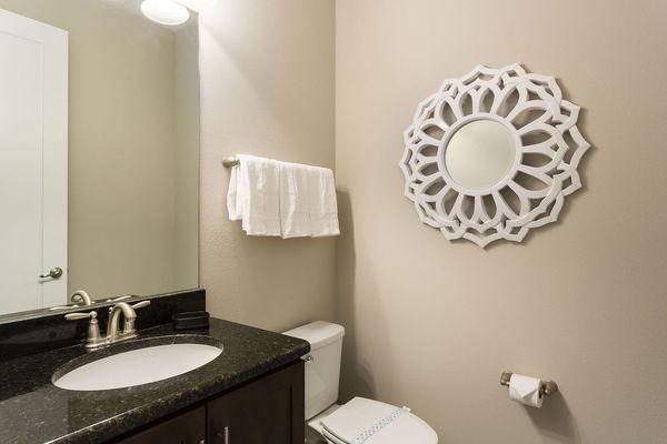 A half bathroom is located on the ground floor