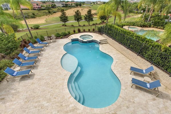 Balcony view of the pool deck right off of the golf course