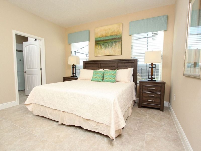 Master King Bedroom 1 Downstairs
Attached Bathroom
Tub & Shower