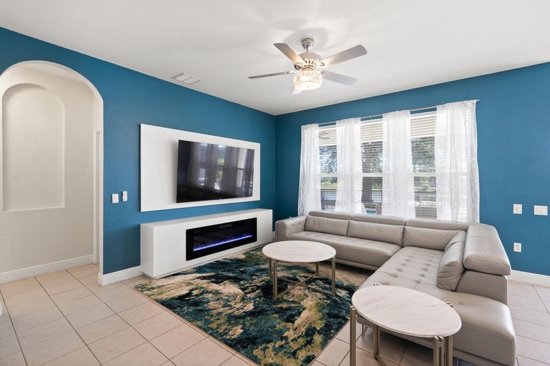 Family Room 75" Roku TV Electric Fireplace