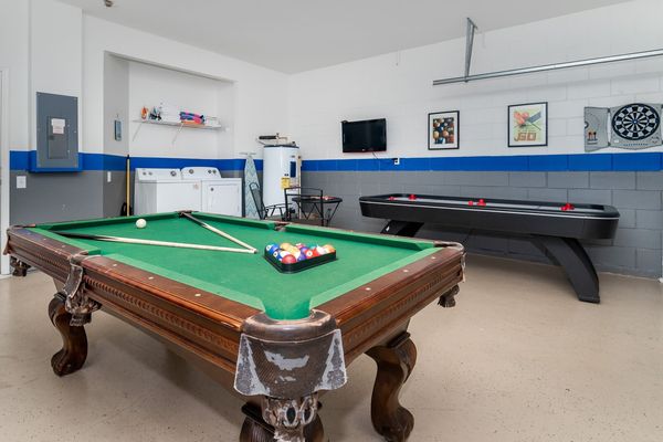 Game Room Downstairs
32" TV
Pool Table Converts to Ping Pong Table
Air Hockey