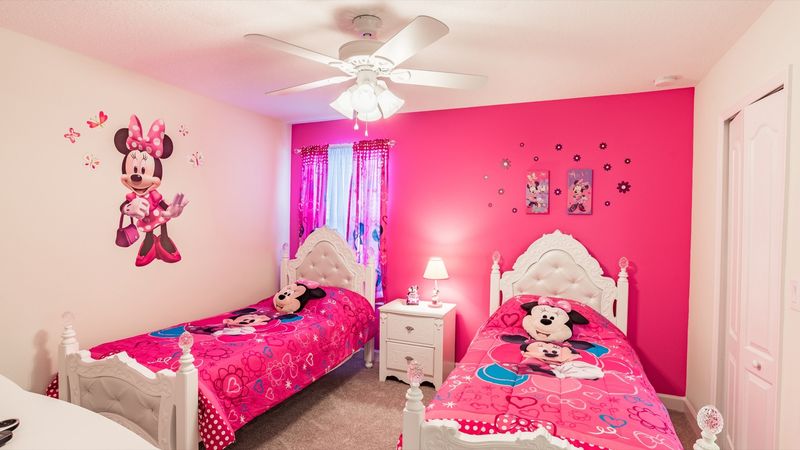 Two Twins Bedroom 3 Upstairs
Shared Bathroom-Shower
Minnie Theme
32" TV