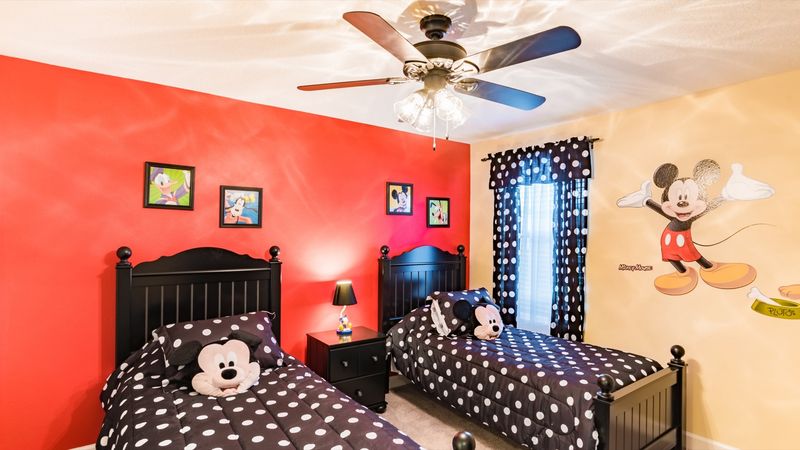 Two Twins Bedroom 8 Upstairs
Shared Bathroom-Shower
Mickey Pluto Theme
28" TV