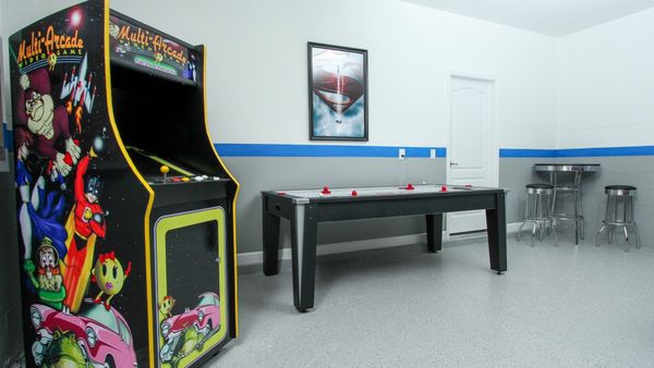 Game Room (Angle )
2/32" TVs 
Xbox
PS3
Video Arcade
Foosball
Air Hockey
Pool Table