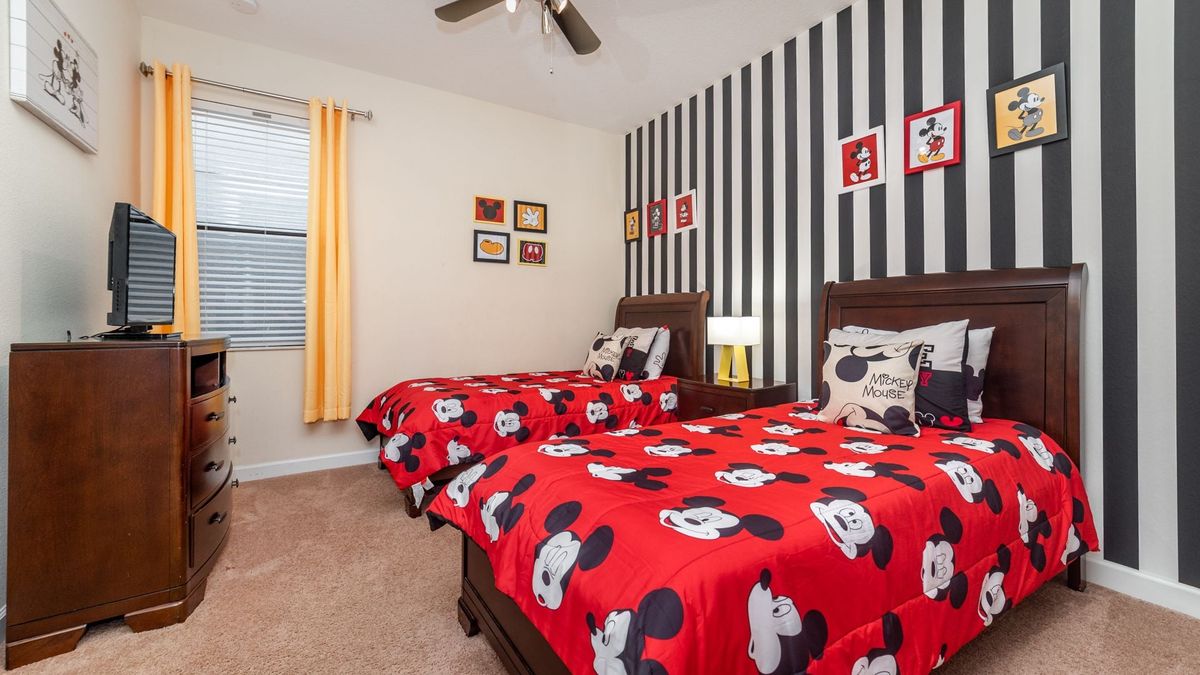 Two Twins Bedroom 3 
Shared Bathroom
32" Roku TV
Mickey Theme