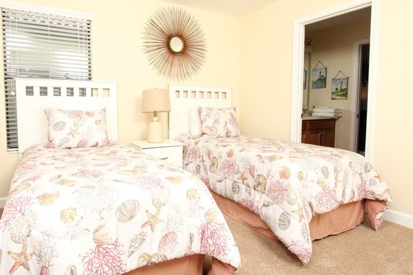 Two Twins Bedroom 5 Upstairs
Shared Bathroom-Shower
32" TV