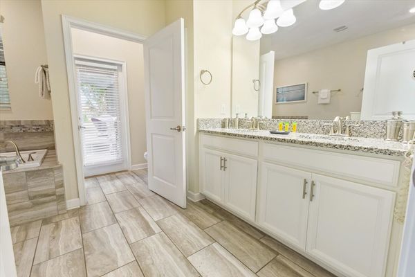 Master King  Bathroom 1, Downstairs
Door To Pool Deck
