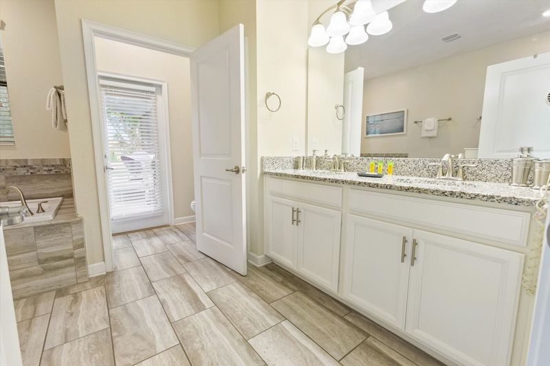 Master King  Bathroom 1, Downstairs
Door To Pool Deck