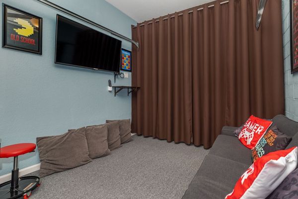 Game Room (Angle) 
55" Smart TV
With plug in port for quests own game system
Has AC