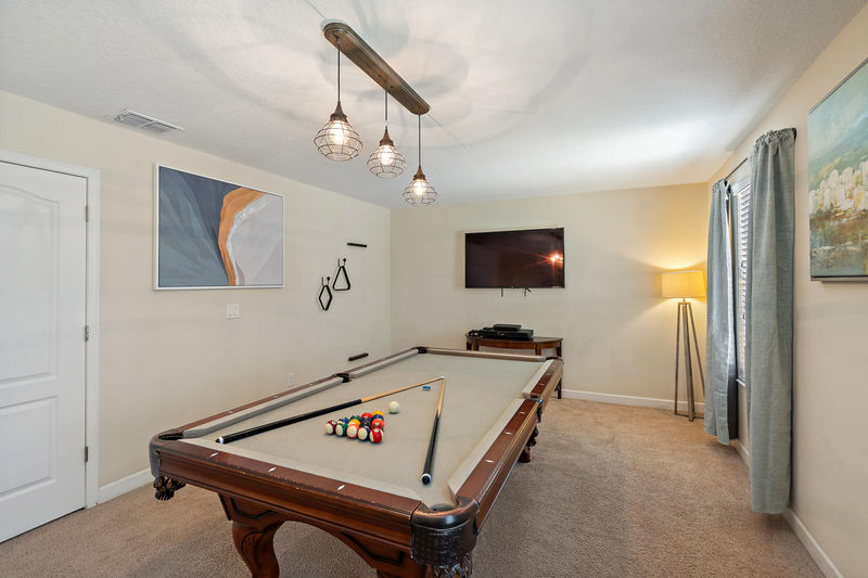 Game Room Upstairs 
55" Smart TV
Pool Table, PS4