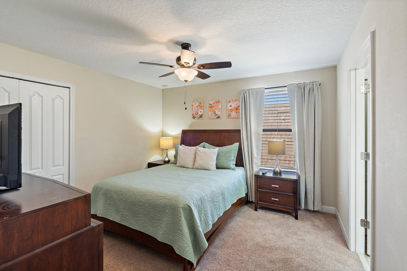 Queen Bedroom 5 Upstairs 
Shared Bathroom (Beds 5 & 6)
32" TV