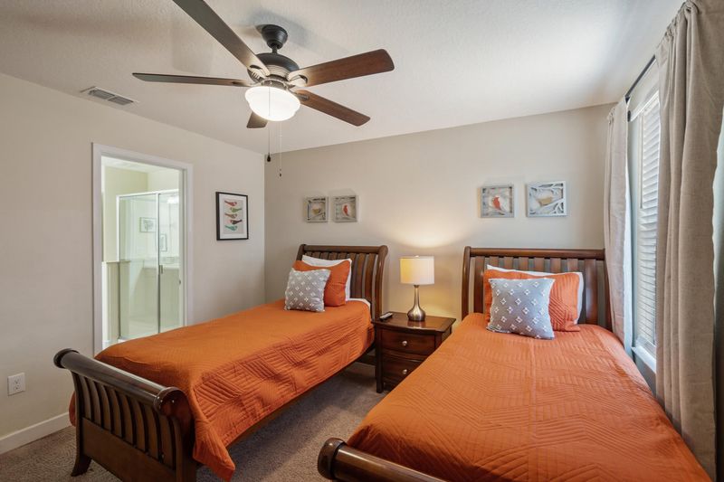 Two Twins Bedroom 6 
Shared Bathroom (Beds 5 & 6)
32" TV