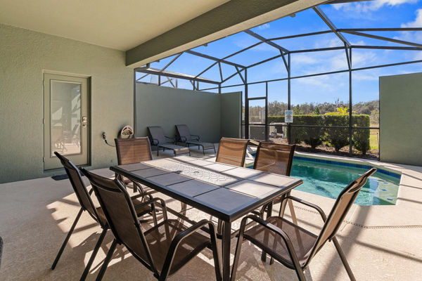 Patio Dining
Pool Faces West