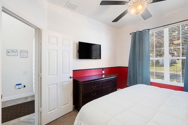 King Suite Bedroom 2 Downstairs, Attached Bathroom, 40" Smart TV Mickey Theme