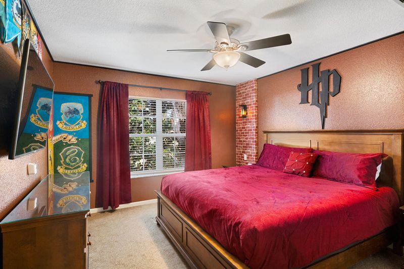 King Suite Bedroom 4 Upstairs Attached Bathroom 55" TV
Harry Potter Theme