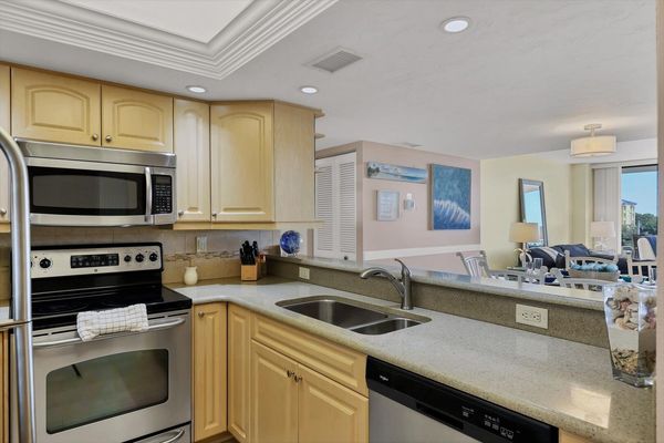 Kitchen overlooking dining room & living room