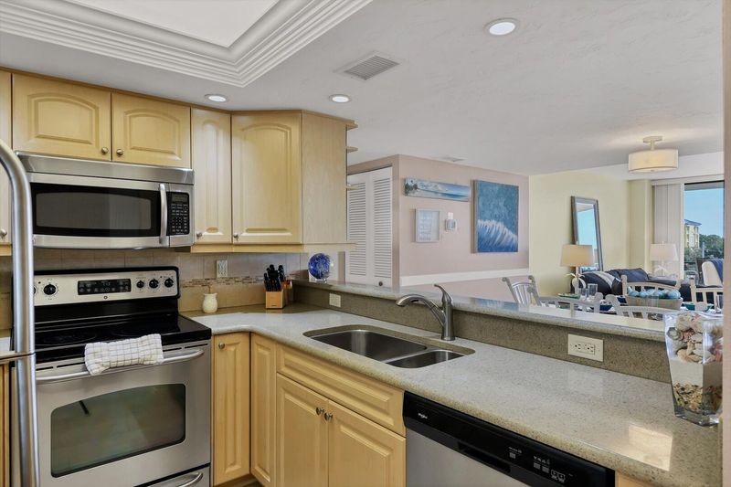 Kitchen overlooking dining room & living room