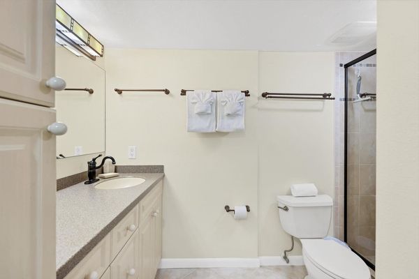 Primary bathroom with large vanity and walk-in shower